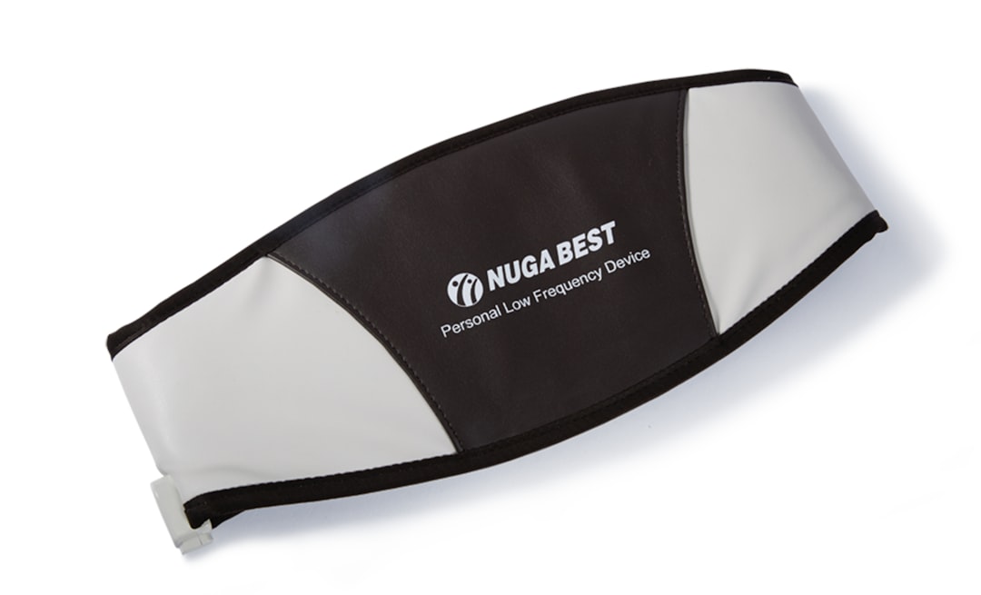 a black and white headband with the nugabest logo on it