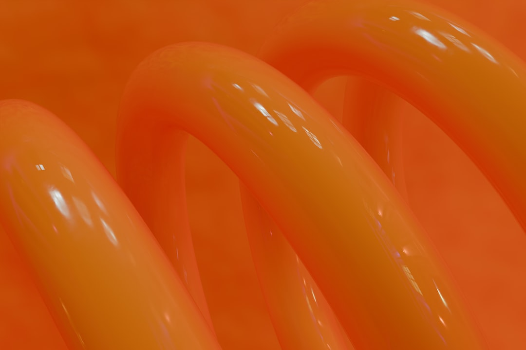 A close up of an orange object with a blurry background